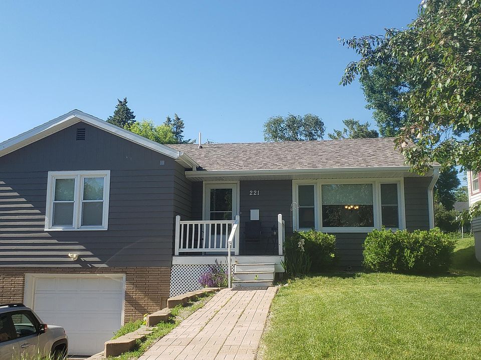 Front view with tuck-under, attached garage