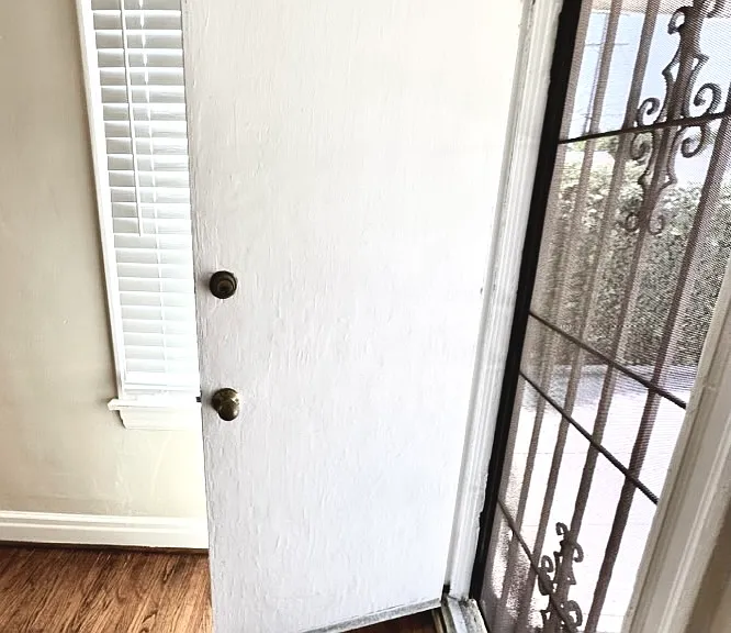 BEDROOM SECURITY DOOR TO REAR OF BUILDING