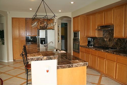 Upgraded kitchen: new marble conters and backsplashes, new stainless steel appliances