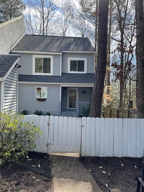 Front-fenced front to back. End unit so its of extra side windows for more natural light. 2 parking spots in front of townhome.