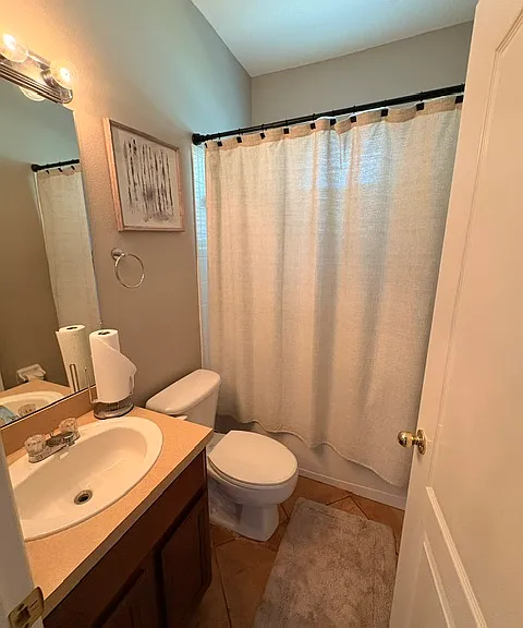 2nd Bathroom by patio and stairs