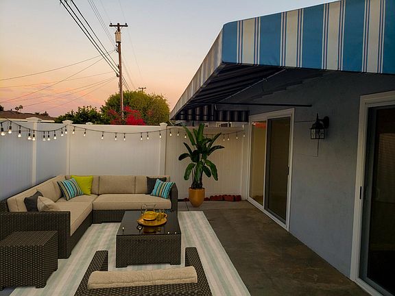 Private enclosed patio. This photo has been virtually staged.