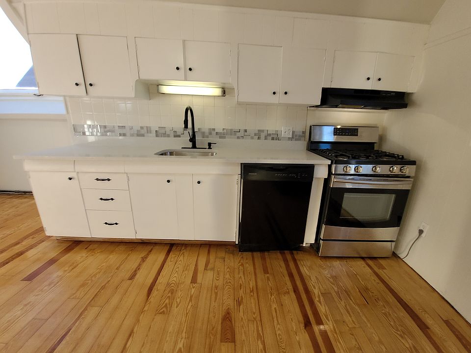 Granite counters, dishwasher, modern, and very spacious kitchen.