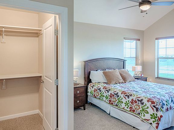 Master Bedroom with cathedral ceilings and walk-in-closets