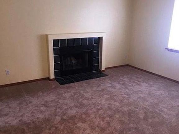 Cozy up to the fireplace in the master bedroom.