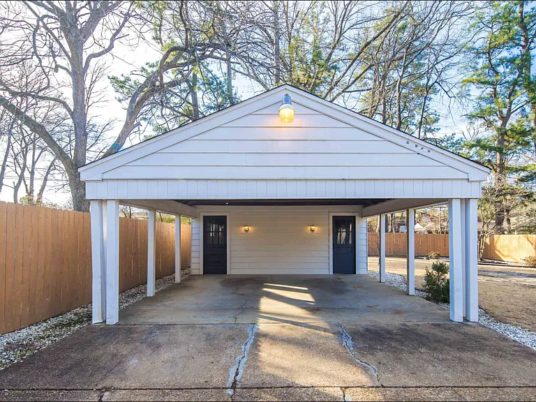 2-car carport with a built-in workshop