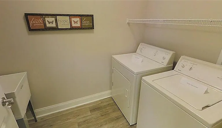 Private Laundry Room with Utility Sink