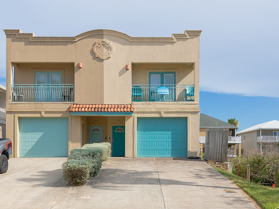This is a duplex with the outside unit facing the bay.
