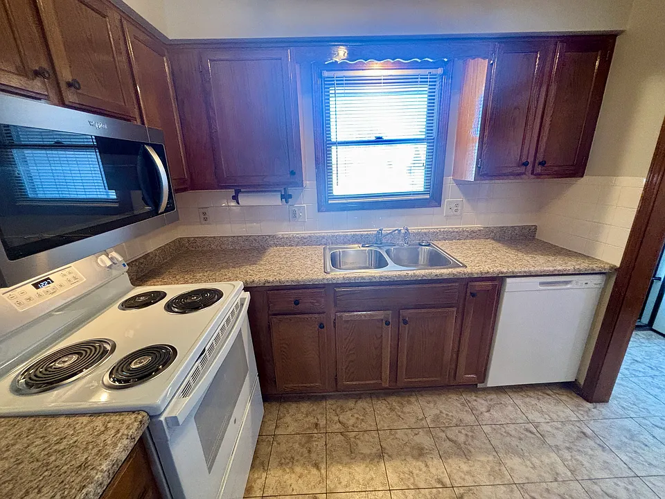 Kitchen with brand new appliances and counter top