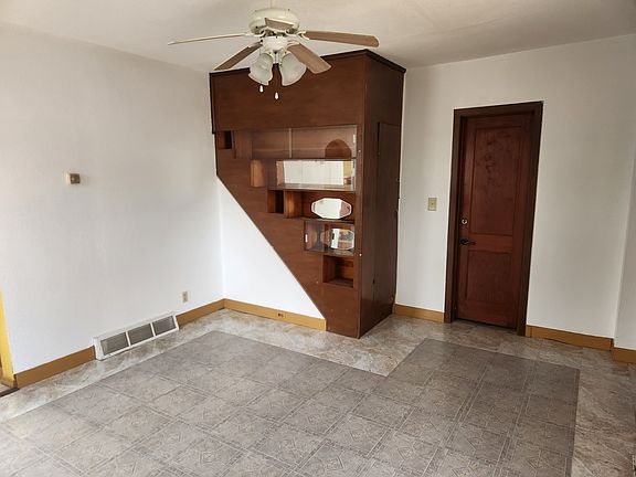 living room with built in cabinet