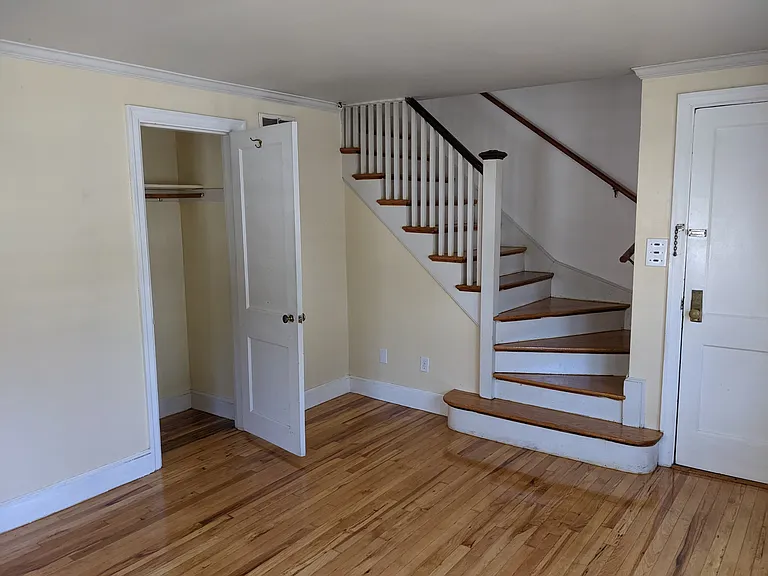 Living Room and steps to upstairs