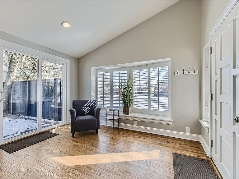 Front Entry, seating area, access to private side patio
