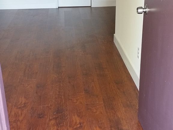 OPENING THE DOOR AND WALKING INTO THE LIVING ROOM YOU SEE HI