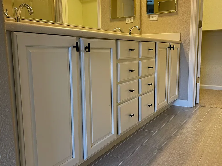 Primary Bedroom - cabinet space in full bathroom