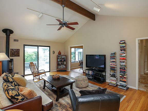 Family Room w/SGDs to Deck - Cathedral Ceiling