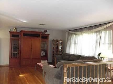 Living Room
						:
						Perfect for entertaining, the living room, kitchen & dining room are all open.