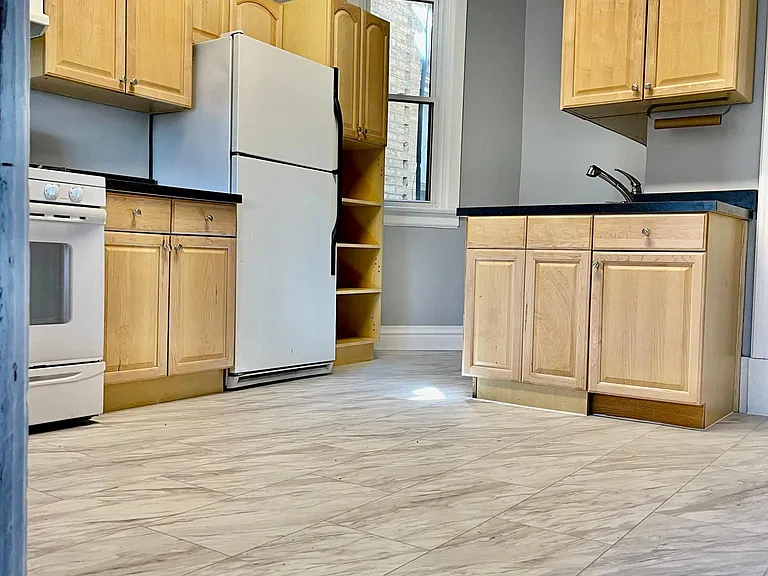 Kitchen featuring brand new flooring