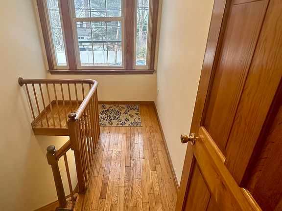 Lovely front foyer to the unit with oversized window to allow for natural light.