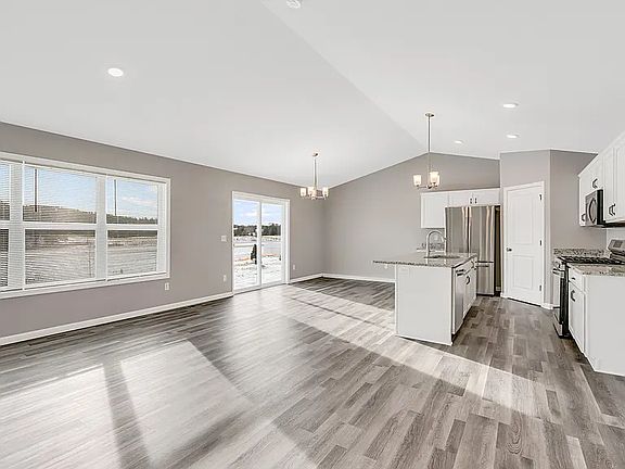 Open Floor Plan With Sunshine !