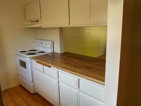 Kitchen looking into Livingroom
