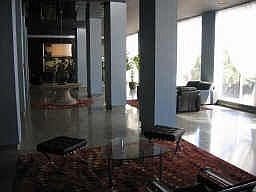 This Lobby Area Overlooks Inviting Pool Below