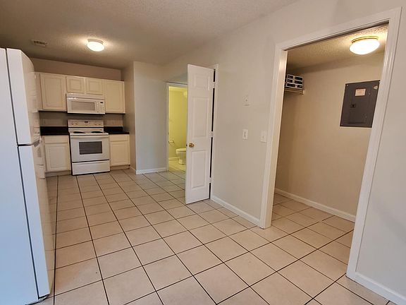 KITCHEN, LAUNDRY, HALF BATH