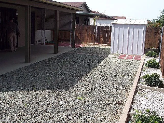 Shed & patio which is now screened in.