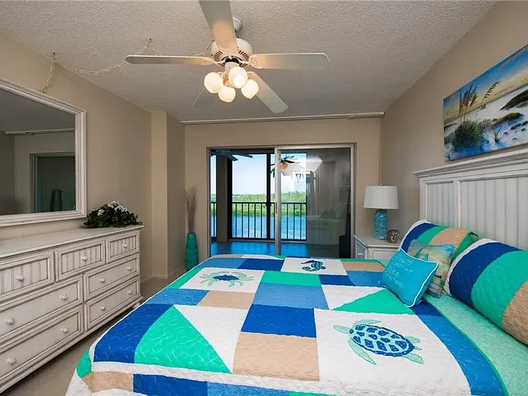 Large bedroom with plenty of dresser drawers, 3 closets, and a bay side lanai (with spare guest twin bed).