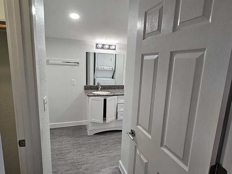Entry to Bathroom with Walk - in - Closet