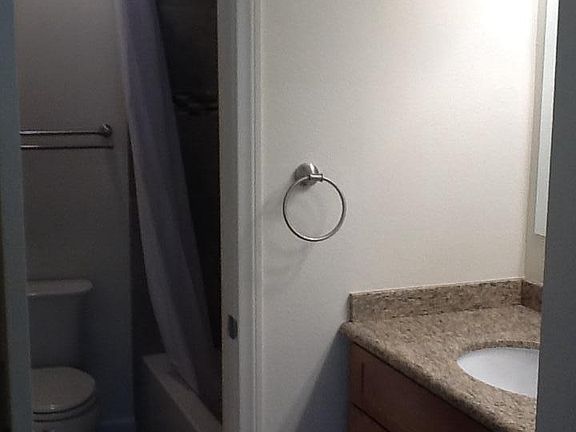 Master bath and vanity in master bedroom