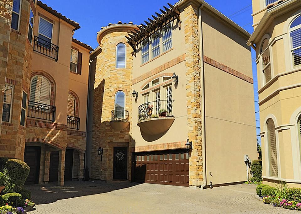 Tuscany Inspired Home nestled away in a small gated community.