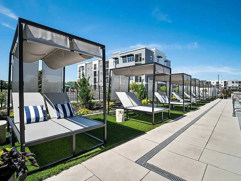 Unwind in style with these luxurious poolside cabanas, perfect for relaxation in a picturesque setting.