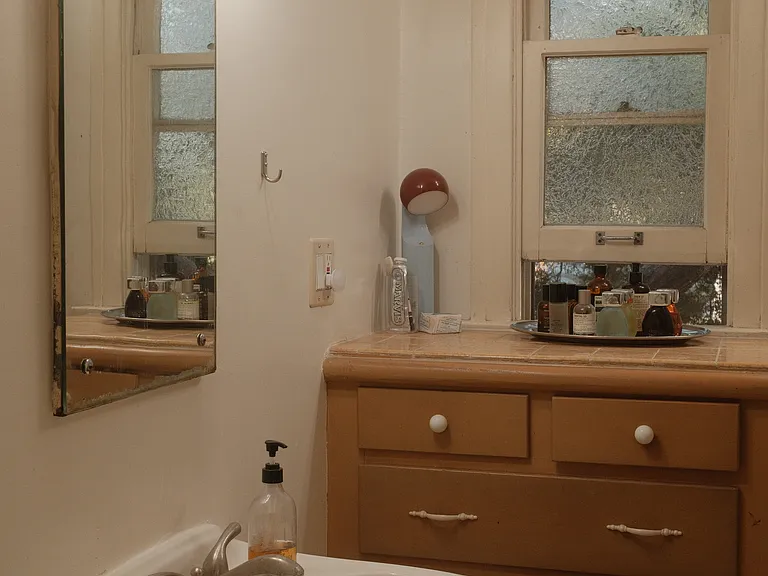Bath. Large mirrored medicine cabinet over vanity area