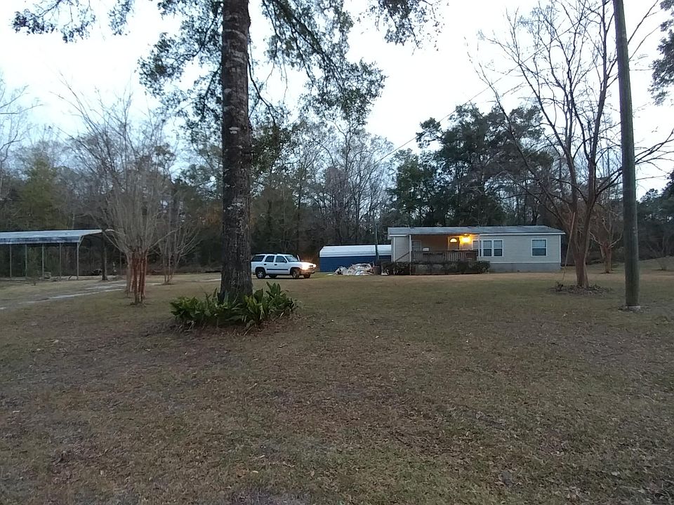 5 acres with pole barn and carport