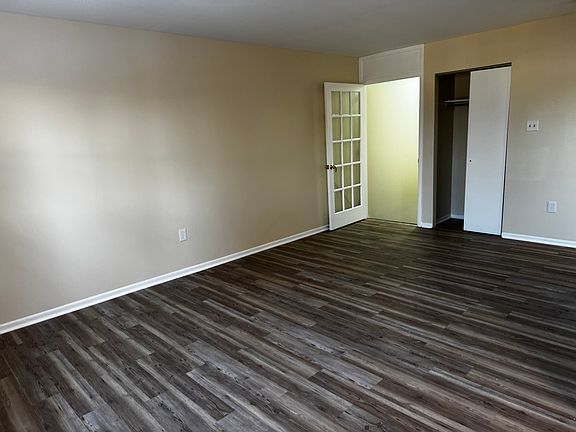 Family room, entry glass door visible.