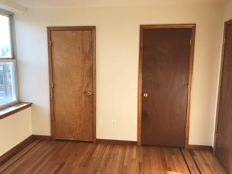 bedroom with closets