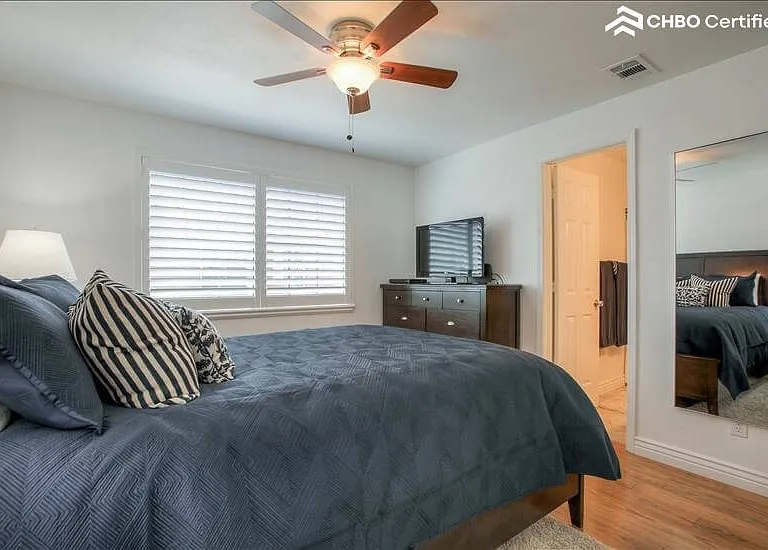Master bedroom opening into private Master ba