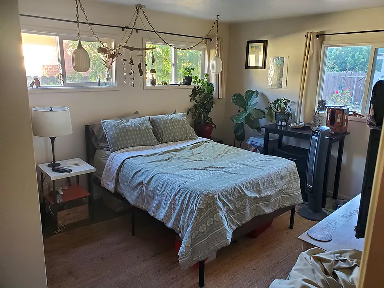 Photo includes previous tenant's belongings, see listing for furnishings that are included. Also there's a new, slightly different bedframe now.