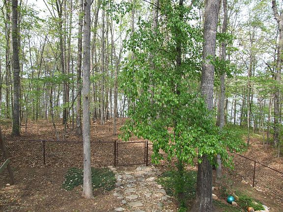 GENTLE SHORT SLOPE TO DOCK; LESS THAN 250 FT