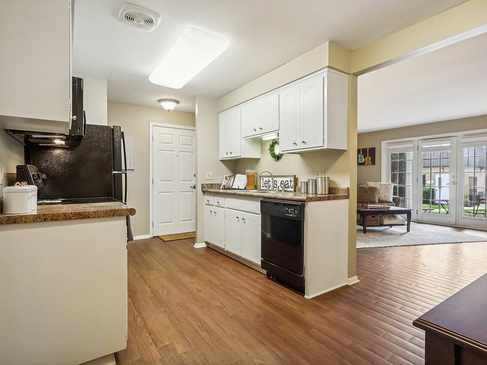 Enjoy a modern kitchen with an open layout at University Oaks Apartments near Kent State University.