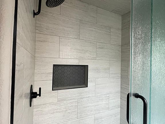 Master Bath Shower with natural steam glass enclosure.