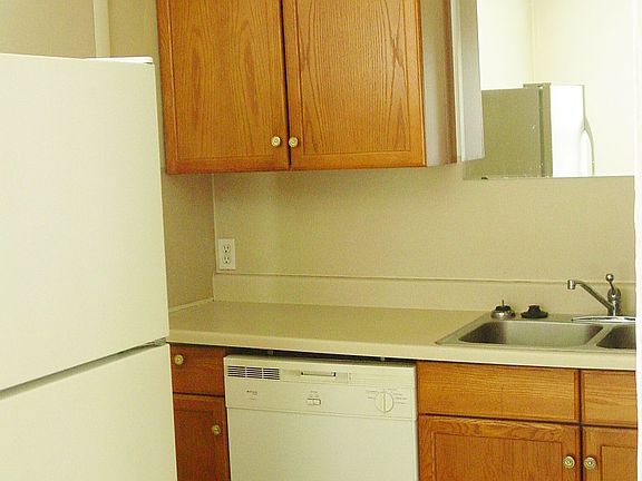 Wonderful Oak cabinetry, dishwasher, stainless double sinks, refrigerator.