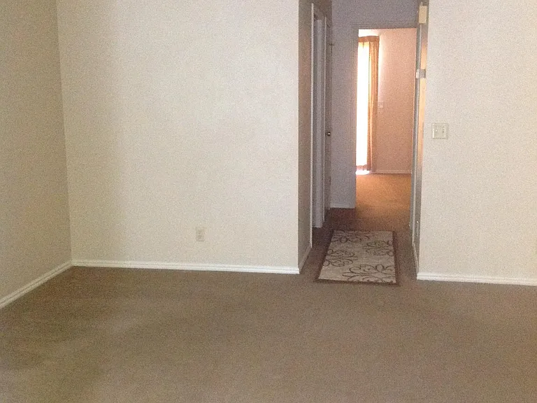 Hallway to private bedrooms