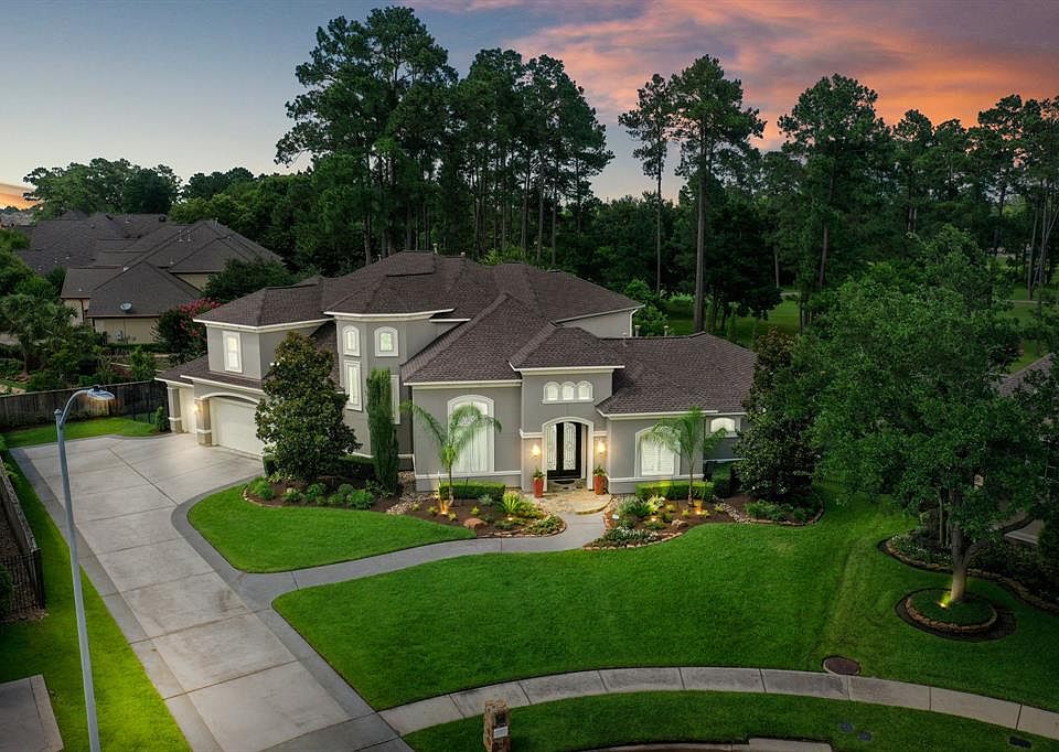 Welcome to 19 Beckins Cliff, a sophisticated home with an inviting year-round backyard retreat.