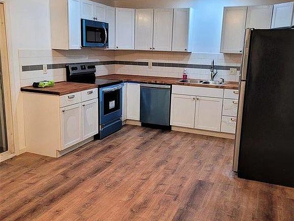 Open layout for kitchen and dining area.