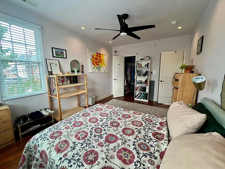 Corner bedroom with walk-in closet