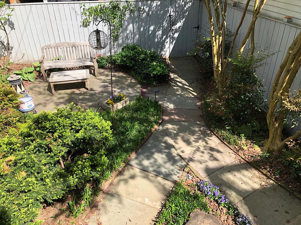 Entrance through rear locked gate.