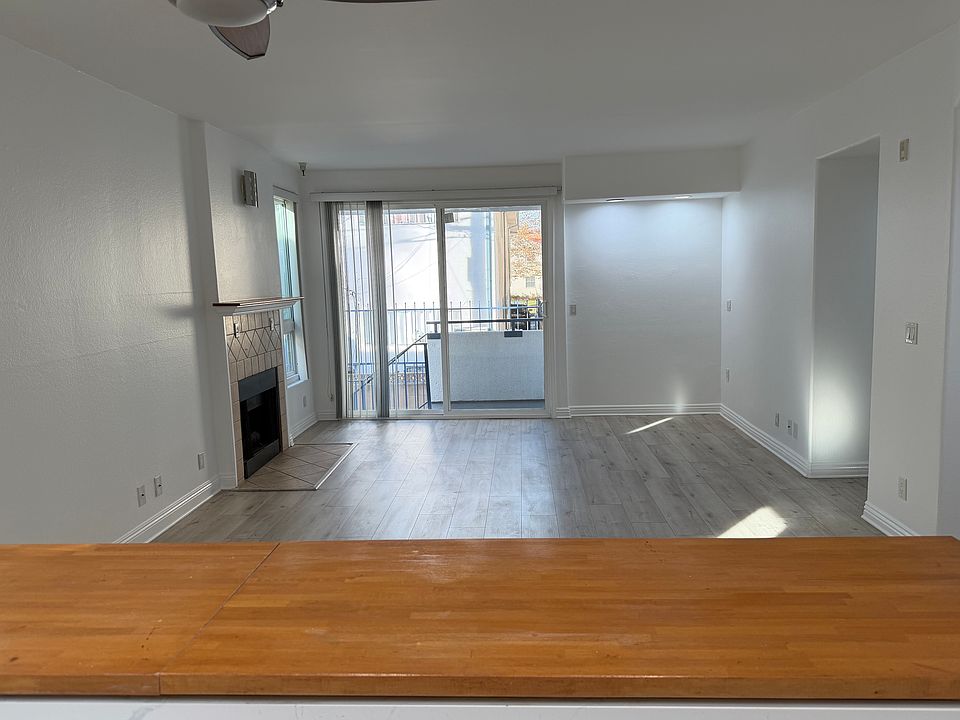 Open Living Room and Dining Room as seen from Kitchen