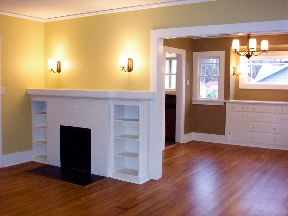 Wood buring fireplace with builins and original mantel
