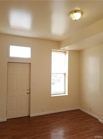 Front room, newer windows throughout.